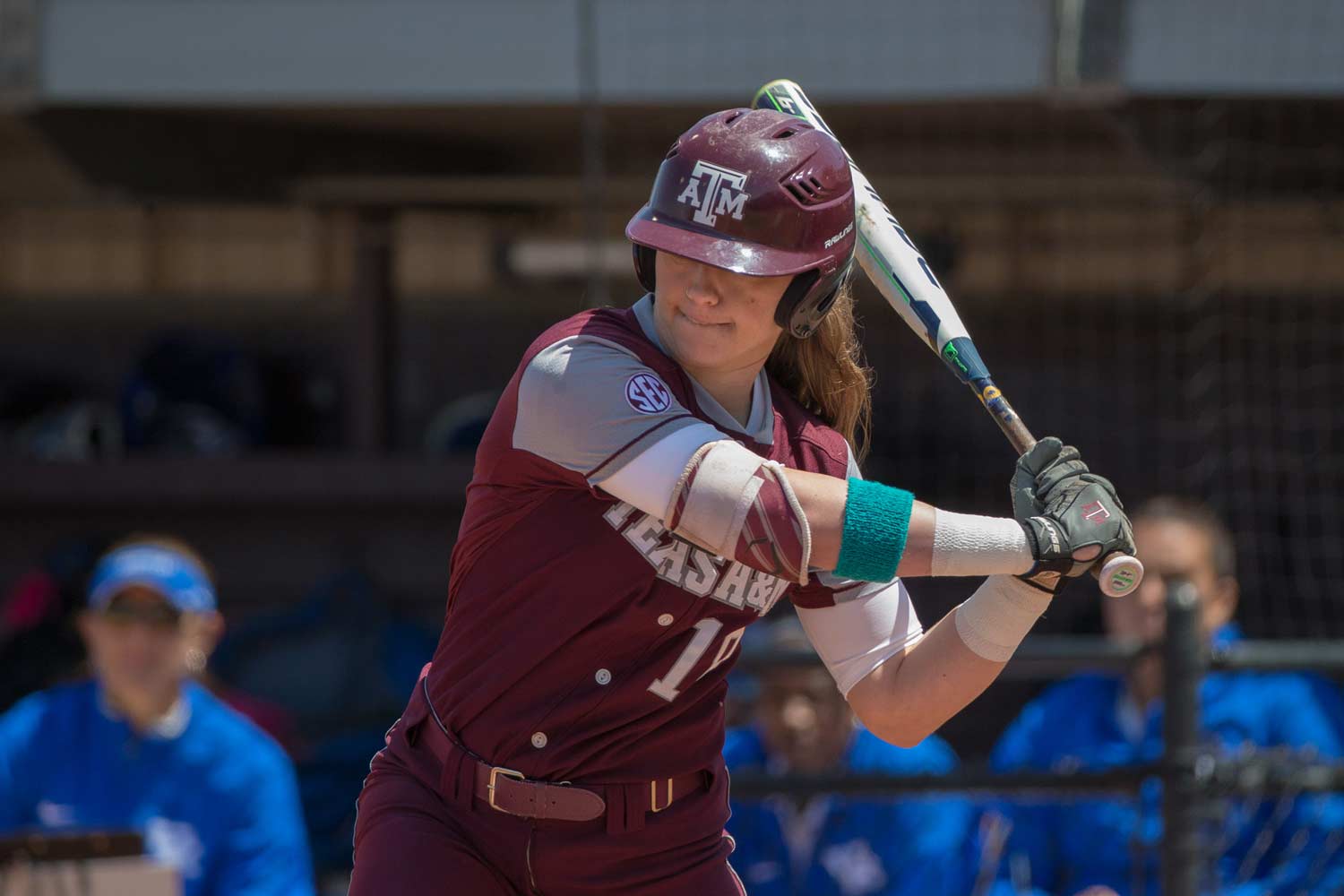 Aggie softball player prepares to swing her bat