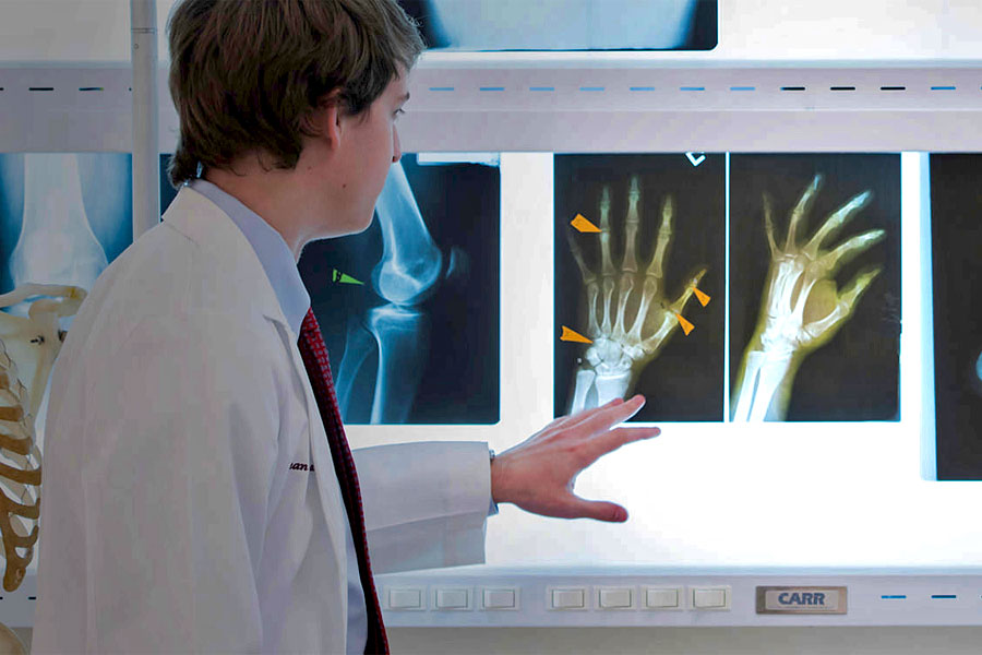 College of Medicine student reviews x-rays