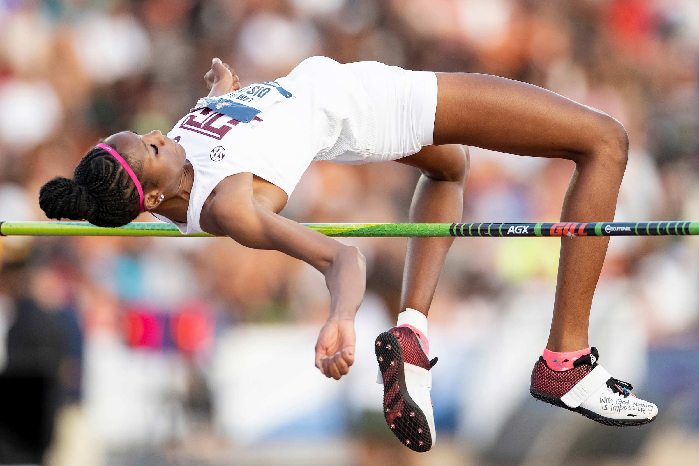 Texas A&M Athletics track and field student doing a jump