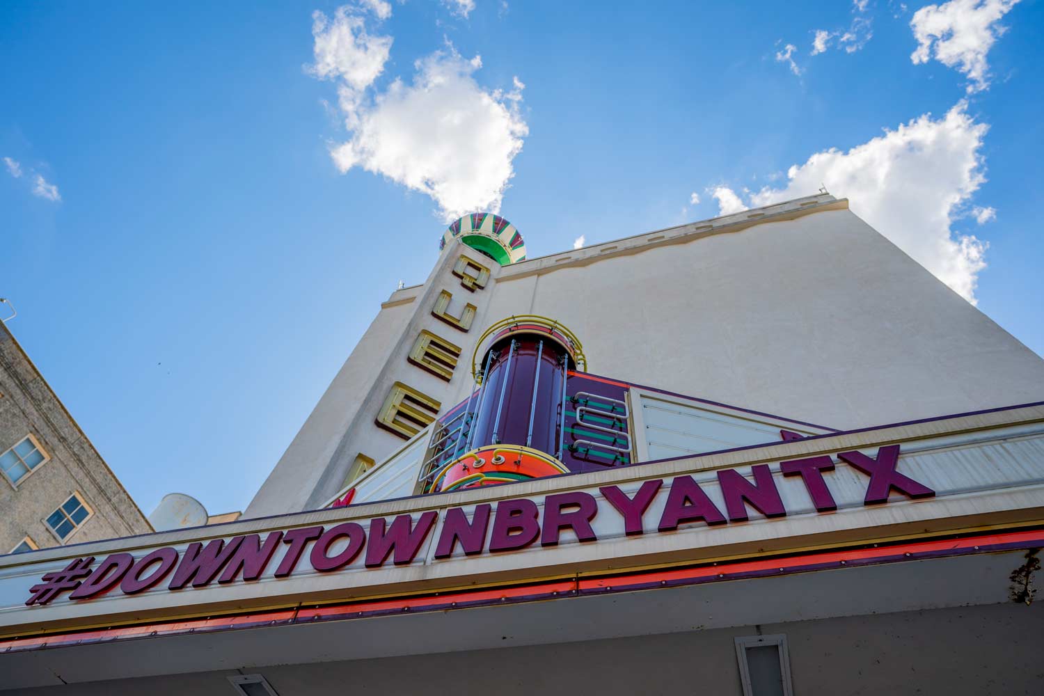 Looking up at the Queen Theater in Downtown Bryan