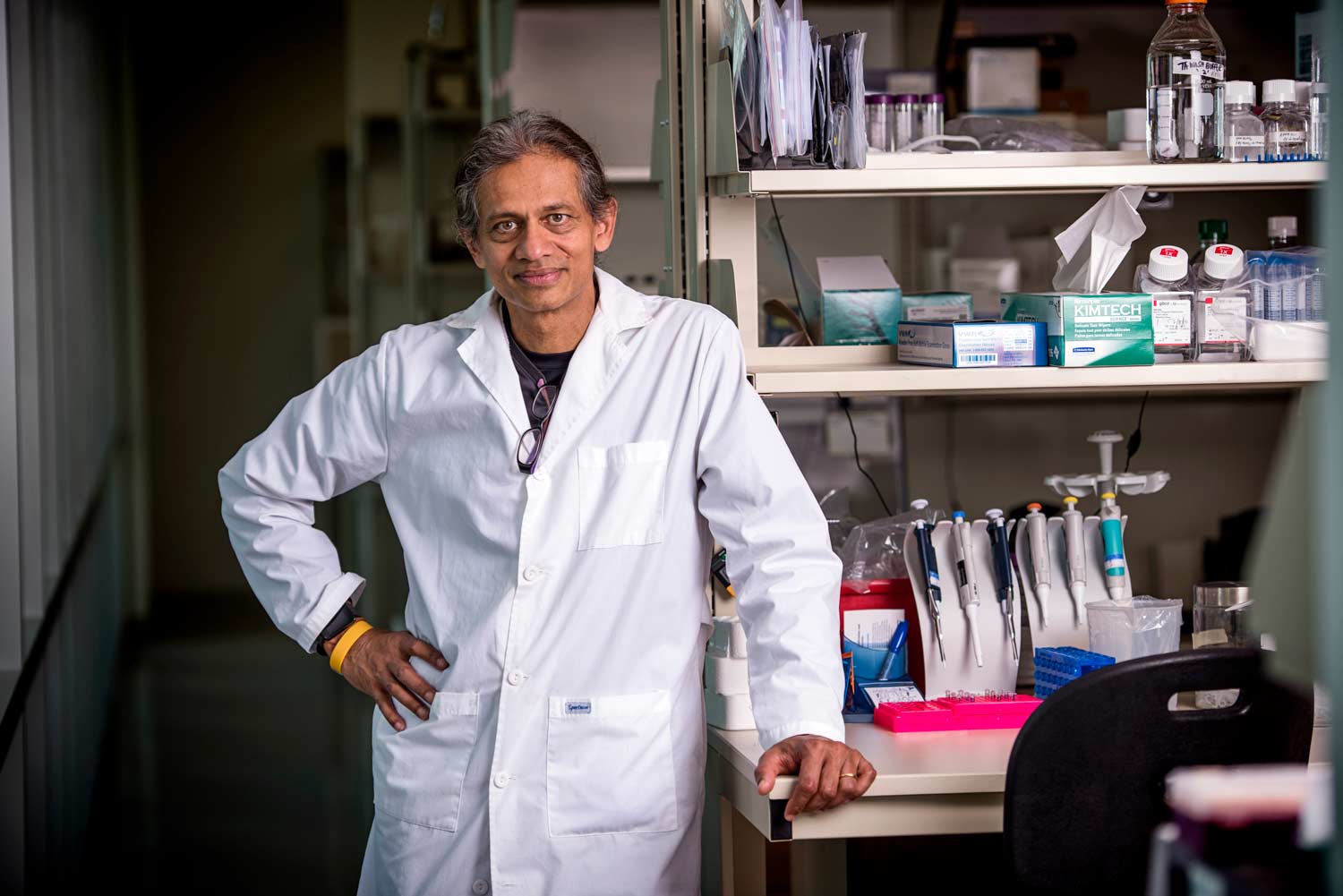 Texas A&M Medicine professor stands in front of equipment that will be utilized in practice