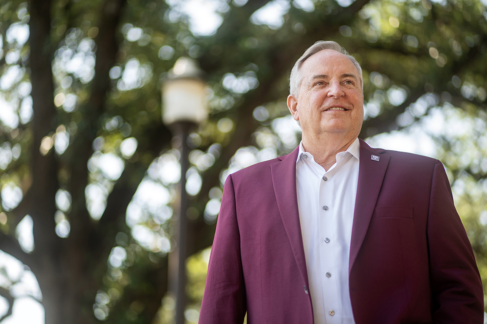 President Welsh walking on campus